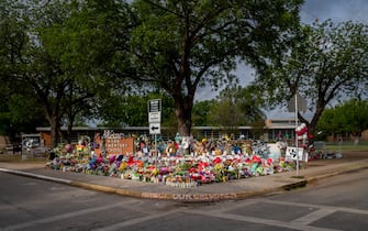 UVALDE, TEXAS - JUNE 01: A memorial dedicated to the 19 children and two adults killed on May 24th during the mass shooting at Robb Elementary School is seen on June 01, 2022 in Uvalde, Texas. Opening wakes and funerals for the 21 victims will be scheduled throughout the week.  (Photo by Brandon Bell/Getty Images)