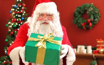 Santa Claus giving gift