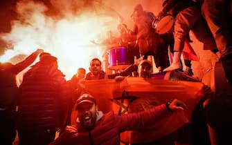 I tifosi marocchini della comunità torinese festeggiano la vittoria del Marocco sul Portogallo ai quarti di finale del mondiale di calcio in Quatar. Torino 10 dicembre 2022 ANSA/TINO ROMANO 