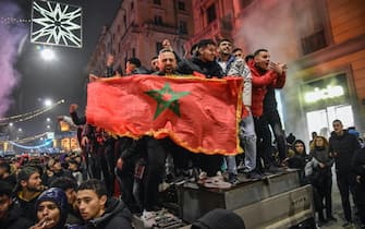 Morocco fans celebrate Morocco's victory against Portugal at the Qatar Soccer World Cup, Milan December 10, 2022. ANSA/MATTEO CORNER