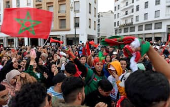 epa10359747 Fans celebrate after Morocco won the FIFA World Cup 2022 quarter final match between Morocco and Portugal, Rabat, Morocco, 10 December 2022.  EPA/JALAL MORCHIDI