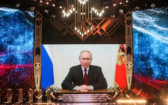 RUSSIA, MOSCOW - DECEMBER 13, 2022: Russia's President Vladimir Putin (on the screen) addresses a ceremony to present the 2022 Znanie Educational Awards at the State Kremlin Palace.  Sergei Karpukhin/TASS/Sipa USA