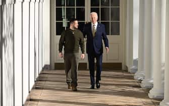 US President Joe Biden walks with Ukraine's President Volodymyr Zelensky through the colonnade of the White House, in Washington, DC on December 21, 2022. - Zelensky is in Washington to meet with US President Joe Biden and address Congress -- his first trip abroad since Russia invaded in February. (Photo by Brendan SMIALOWSKI / AFP) (Photo by BRENDAN SMIALOWSKI/AFP via Getty Images)