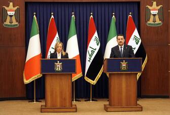epa10377106 A handout photo made available by the Iraqi Prime Ministry Press Office shows Iraqi Prime Minister Mohammed Shia al-Sudani and Italian Prime Minister Giorgia Meloni giving a press conference in Baghdad, Iraq, 23 December 2022. According to the Iraqi Prime Minister's office, the two officials had talks on cooperation in the fields of agriculture and health, and various aspects of economic and trade exchange.  EPA/IRAQI PRIME MINISTER OFFICE HANDOUT  HANDOUT EDITORIAL USE ONLY/NO SALES