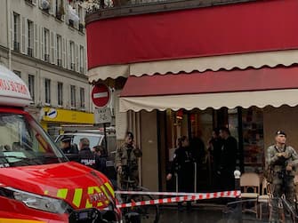 French police and Vigipirate secure the street after several shots were fired along rue d'Enghien in the 10th arrondissement, in Paris on December 23, 2022. - Two people were killed and four injured in a shooting in central Paris on December 23, 2022, police and prosecutors said, adding that the shooter, in his 60s, had been arrested. The motives of the gunman remain unclear, with two of the four injured left in a serious condition, the French officials said. (Photo by Luka Bakaric-Mulholland / AFP) (Photo by LUKA BAKARIC-MULHOLLAND/AFP via Getty Images)