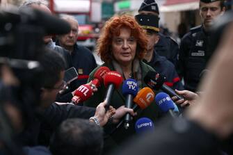 Paris prosecutor Laure Beccuau speaks to the press after several shots were fired along rue d'Enghien in the 10th arrondissement, in Paris on December 23, 2022. - Three people were killed and four injured in a shooting along rue d'Enghien in central Paris on December 23, 2022, police and prosecutors said, adding that the shooter, in his 60s, had been arrested. (Photo by Thomas SAMSON / AFP) (Photo by THOMAS SAMSON/AFP via Getty Images)