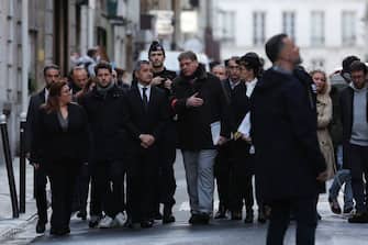 French Interior Minister Gerald Darmanin (C-L) arrives at the site where several shots were fired along rue d'Enghien in the 10th arrondissement, in Paris on December 23, 2022. - Two people were killed and four injured in a shooting in central Paris on December 23, 2022, police and prosecutors said, adding that the shooter, in his 60s, had been arrested. The motives of the gunman remain unclear, with two of the four injured left in a serious condition, the French officials said. (Photo by Thomas SAMSON / AFP) (Photo by THOMAS SAMSON/AFP via Getty Images)