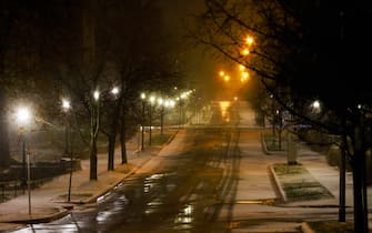 Indiana Avenue is covered with ice and a thin layer of snow during a winter storm in Bloomington. The temperature had been in the 40s earlier on Thursday, but the temperature had dropped to -1 degree by Friday at 12:22 a.m.