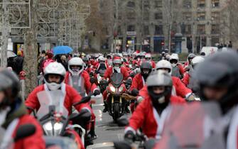 motorcycle ride dressed as Santa Claus