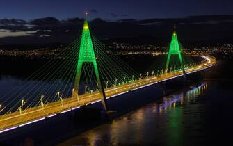 In Budapest, Hungary, a bridge lit up for Christmas