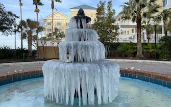 TOPSHOT - Ice adorns a fountain in Charleston, South Carolina, on December 24, 2022, where temperatures are forecast to reach a high of 32F (0C). - The  winter storm that pummelled the US with blinding snow and powerful Arctic winds left 1.7 million customers without power on December 24 as thousands of cancelled flights stranded travelers. At least 13 storm-related deaths have been confirmed across six states as heavy snow, howling winds and dangerously frigid temperatures kept much of the nation, including the normally temperate south, in a frozen grip for a third straight day. (Photo by PEDRO UGARTE / AFP) (Photo by PEDRO UGARTE/AFP via Getty Images)