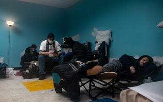 1245821596 Warming shelters are set up all around the city like this one for those whom need a place to stay , rather they are homeless , stuck in the snow etc. these shelters can be life or death for some in Buffalo . Buffalo emerges from a historic blizzard Sunday, December 25, 2022. The storm caused fatalities, left rescue crews stranded and widespread power outages., Dec , 25 , 2022