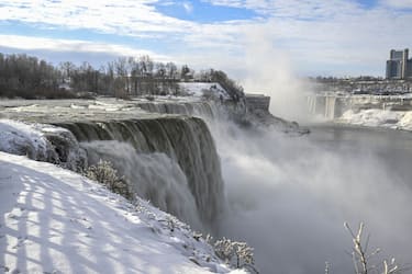 NEW YORK, UNITED STATES - DECEMBER 27: A view of Niagara Falls as it is partially frozen due to extreme cold weather in the Northeast in New York, United States on December 27, 2022. (Photo by Fatih Aktas/Anadolu Agency via Getty Images)