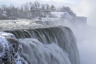NEW YORK, UNITED STATES - DECEMBER 27: A view of Niagara Falls as it is partially frozen due to extreme cold weather in the Northeast in New York, United States on December 27, 2022. (Photo by Fatih Aktas/Anadolu Agency via Getty Images)