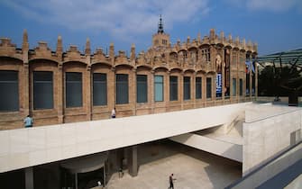 SPAIN - JANUARY 11: Entrance (1999-2002, architect Arata Isozaki) to CaixaForum, opened in the former Casaramona factory (1909-1910, architect Josep Puig i Cadafalch), Barcelona, Spain. (Photo by DeAgostini/Getty Images)