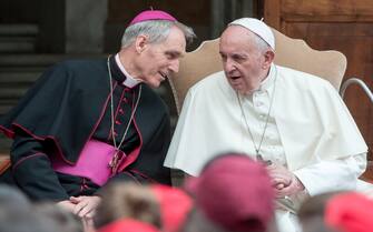NO FRANCE - NO SWITZERLAND: June 8, 2019 : Msgr. Georg Ganswein talk to Pope Francis as he meets 400 children from different Italian regions who came by train to the Vatican, in the courtyard of San Damaso, in the Vatican.
