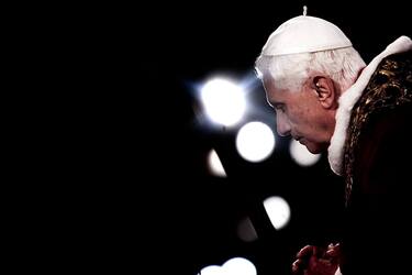 Pope Benedict XVI celebrates the "Via Crucis," the Way of the Cross, at the Colosseum in Rome. (Photo by Alessandra Benedetti/Corbis via Getty Images)