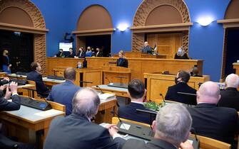 ESTONIA GOVERNMENT epa08966005 A handout picture provided by the Riigikogu (Estonian Parliament) shows Reform party leader Kaja Kallas (C) during a Riigikogu plenary session in Tallinn, Estonia, 26 January 2021. During the plenary session members of the new government took the oath of office. Estonian president Kersti Kaljulaid appointed the government of Kaja Kallas on 26 January morning. Kallas, Estonia's first female prime minister, has formed a government with the Center Party after two weeks of negotiations. EPA/Erik Peinar / HANDOUT HANDOUT EDITORIAL USE ONLY/NO SALES