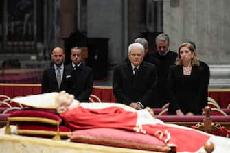 A handout picture provided by the Vatican Media shows Italian President Sergio Mattarella pays her respects to Pope Emeritus Benedict XVI (Joseph Ratzinger) whose body lies in state in the Saint Peter's Basilica for public viewing, Vatican City, 02 January 2023. The funeral will take place on Thursday 05 January.The funeral will take place on Thursday 05 January. 
ANSA/ VATICAN MEDIA +++ ANSA PROVIDES ACCESS TO THIS HANDOUT PHOTO TO BE USED SOLELY TO ILLUSTRATE NEWS REPORTING OR COMMENTARY ON THE FACTS OR EVENTS DEPICTED IN THIS IMAGE; NO ARCHIVING; NO LICENSING +++ (NPK)