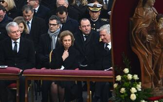 Former Queen Sofia of Spain (C) and King Philippe of Belgium (R) attend the funeral mass of Pope Emeritus Benedict XVI at St. Peter's square in the Vatican, on January 5, 2023. - Pope Francis will preside on January 5 over the funeral of his predecessor Benedict XVI at the Vatican, an unprecedented event in modern times expected to draw tens of thousands of people. (Photo by Filippo MONTEFORTE / AFP) (Photo by FILIPPO MONTEFORTE/AFP via Getty Images)