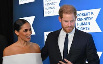 Prince Harry, Duke of Sussex, and Meghan, Duchess of Sussex, arrive at the 2022 Robert F. Kennedy Human Rights Ripple of Hope Award Gala at the Hilton Midtown in New York on December 6, 2022. (Photo by ANGELA WEISS / AFP)