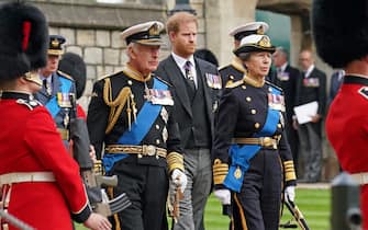 (left to right) The Duke of Sussex, King Charles III and the Princess Royal follow the State Hearse carrying the coffin of Queen Elizabeth II, draped in the Royal Standard with the Imperial State Crown and the Sovereign's Orb and Sceptre, as it arrives at the Committal Service held at St George's Chapel in Windsor Castle, Berkshire. Picture date: Monday September 19, 2022.