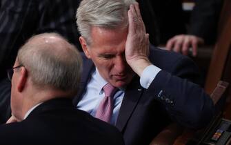 WASHINGTON, DC - JANUARY 06: U.S. House Republican Leader Kevin McCarthy (R-CA) rubs his face during the fourth day of elections for Speaker of the House at the U.S. Capitol Building on January 06, 2023 in Washington, DC. The House of Representatives is meeting to vote for the next Speaker after McCarthy failed to earn more than 218 votes on several ballots over three days; the first time in 100 years that the Speaker was not elected on the first ballot.   Kevin Dietsch/Getty Images/AFP (Photo by Kevin Dietsch / GETTY IMAGES NORTH AMERICA / Getty Images via AFP)