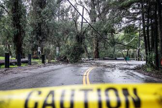 1246138518 Downed power lines after a rain storm in Montecito, California, US, on Tuesday, Jan. 10, 2023. California faces more drenching rain, as concerns about drought have been replaced by fears of flooding thats killed at least 14 people, closed highways and sent residents fleeing for their lives. Photographer: Erica Urech/Bloomberg via Getty Images