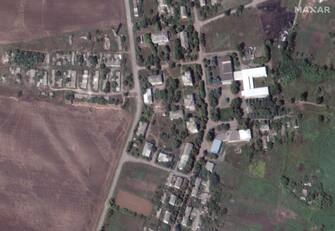 BAKHMUTSKE, UKRAINE -- AUGUST 1, 2022: 03 Maxar satellite (BEFORE) imagery of the start of the siege in eastern Ukraine showing school and buildings in Bakhmutske, Ukraine.  01aug2022_wv3.  Please use: Satellite image (c) 2022 Maxar Technologies.