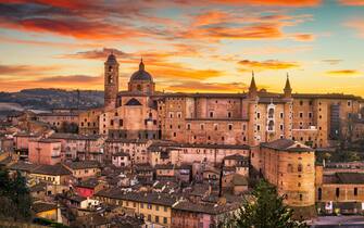 Urbino, Italy medieval walled city in the Marche region at twilight.