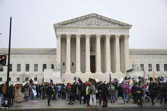 WASHINGTON D.C., UNITED STATES - JANUARY 22 : Pro-abortion and anti-abortion activists rally near the US Supreme Court in Washington, DC, USA, 22 January 2023. WomenÃ¢s marches demanding abortion rights drew thousands of people across the country on Sunday, the 50th anniversary of the now-overturned Roe v. Wade Supreme Court decision that established federal protections for the procedure. (Photo by Celal Gunes/Anadolu Agency via Getty Images)