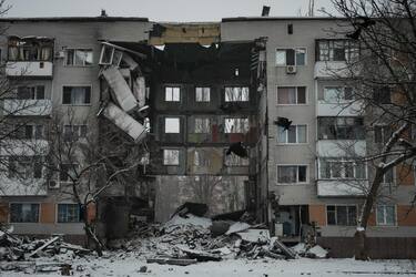 The view of a destroyed building in Bakhmut, in the Donetsk region, on January 30, 2023, amid the Russian invasion of Ukraine. - The frontline city of Bakhmut has seen some of the heaviest fighting in recent months. (Photo by YASUYOSHI CHIBA / AFP)