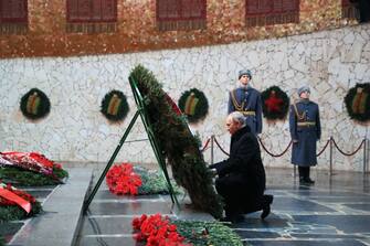 Russian President Vladimir Putin lays a wreath to the Eternal Flame at the Hall of Military Glory at the Mamayev Kurgan World War Two Memorial complex in Volgograd on February 2, 2023, during commemorations for the 80th anniversary of the Soviet victory at the Battle of Stalingrad during WWII. (Photo by Dmitry LOBAKIN / SPUTNIK / AFP) (Photo by DMITRY LOBAKIN/SPUTNIK/AFP via Getty Images)