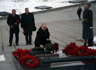 VOLGOGRAD, RUSSIA - FEBRUARY 2: (RUSSIA OUT) Russian President Vladimir Putin puts flowers while visiting the Mamayev Kurgan, a memorial comlplex commemorating the heroes of the Battle of Stalingrad on February 2, 2023, in Volgograd, Russia. President Putin has travelled for a one-day visit to the city of Volgograd (former Stalingrad) to mark the anniversary of the major battle on the Eastern Front of the Second World War. (Photo by Contributor/Getty Images)