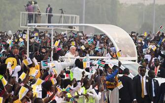 1246809611 Pope Francis (C) waves as he arrives by popemobile for the holy mass at the John Garang Mausoleum in Juba, South Sudan, on February 5, 2023. - Pope Francis wraps up his pilgrimage to South Sudan with an open-air mass on February 5, 2023 after urging its leaders to focus on bringing peace to the fragile country torn apart by violence and poverty.
The three-day trip is the first papal visit to the largely Christian country since it achieved independence from Sudan in 2011 and plunged into a civil war that killed nearly 400,000 people. (Photo by Tiziana FABI / AFP) (Photo by TIZIANA FABI/AFP via Getty Images)
