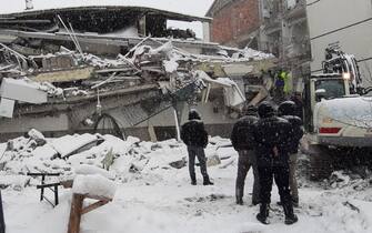 ADANA, TURKIYE - FEBRUARY 6: A view of a collapsed building as search and rescue works continue after a 7.4 magnitude earthquake hit southern provinces of Turkiye, in Adana, Turkiye on February 6, 2023. The 7.4 magnitude earthquake jolted Turkiyeâs southern province of Kahramanmaras early Monday, according to Turkiyeâs Disaster and Emergency Management Authority (AFAD). It was followed by a magnitude 6.4 quake that struck southeastern Gaziantep province. A third earthquake with a 6.5 magnitude also hit Gaziantep. Earthquakes had affected several provinces including, Osmaniye, Malatya, AdÄ±yaman, Adana, DiyarbakÄ±r, Kilis and Sanliurfa. (Photo by Mustafa Yilmaz/Anadolu Agency via Getty Images)