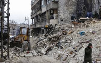 EDITORS NOTE: Graphic content / Syrians search for victims and survivors at the rubble a collapsed building in the city of Aleppo following a deadly earthquake on February 6, 2023. - The Syrian government urged the international community to come to its aid after more than 850 people died in the country following a 7.8-magnitude earthquake in neighbouring Turkey. (Photo by LOUAI BESHARA / AFP) (Photo by LOUAI BESHARA/AFP via Getty Images)