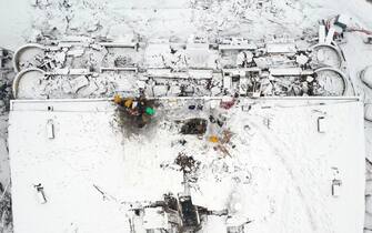 MALATYA, TURKIYE - FEBRUARY 07: An aerial view of collapsed building as search and rescue efforts continue in Malatya after 7.7 and 7.6 magnitude earthquakes hit Kahramanmaras, Turkiye on February 7, 2023. Early Monday morning, a strong 7.7 earthquake, centered in the Pazarcik district, jolted Kahramanmaras and strongly shook several provinces, including Gaziantep, Sanliurfa, Diyarbakir, Adana, Adiyaman, Malatya, Osmaniye, Hatay, and Kilis. Later, at 13.24 p.m. (1024GMT), a 7.6 magnitude quake centered in Kahramanmaras' Elbistan district struck the region. Turkiye declared 7 days of national mourning after deadly earthquakes in southern provinces. (Photo by Hakan Burak Altunoz/Anadolu Agency via Getty Images)