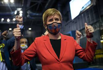 epa09183767 Scotland's First Minister and leader of the Scottish National Party (SNP), Nicola Sturgeon celebrates being declared the winner of the Glasgow Southside seat at Glasgow counting centre in the Emirates Arena in Glasgow, Britain 07 May 2021. People in Scotland headed to the polls on 06 May to elect 129 members of the Scottish Parliament. The vote count began on 07 May and the final results are expected to be announced on 08 May.  EPA/ROBERT PERRY