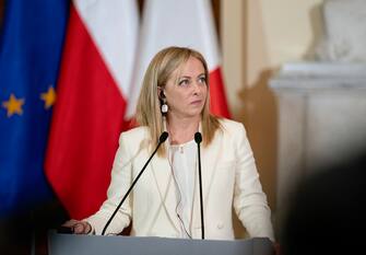 The handout picture provided by the Chigi Palace Press Office shows Italian Prime Minister Giorgia Meloni and Polish Prime Minister Mateusz Morawiecki (unseen) during a press conference in Warsaw, Poland, 20 February 2023. ANSA/ CHIGI PALACE PRESS OFFICE/ FILIPPO ATTILI +++ ANSA PROVIDES ACCESS TO THIS HANDOUT PHOTO TO BE USED SOLELY TO ILLUSTRATE NEWS REPORTING OR COMMENTARY ON THE FACTS OR EVENTS DEPICTED IN THIS IMAGE; NO ARCHIVING; NO LICENSING +++ NPK +++