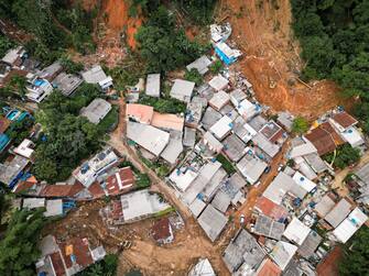 Damage from a landslide following heavy rain and flooding in Barra do Sahy, Sao Paulo state, Brazil, on Friday, Feb. 24, 2023. Heavy rains inundated the Sao Paulo coast during the week of Carnival, causing flooding and landslides that left dozens dead and missing.  Photographer: Tuane Fernandes/Bloomberg via Getty Images