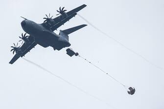 A A400M aicraft unloads a military vehicle for parachutage during a large-scale military drill called "Orion" in Castres, southwestern France, on February 25, 2023. (Photo by Charly TRIBALLEAU / AFP) (Photo by CHARLY TRIBALLEAU/AFP via Getty Images)