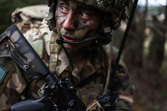 A French paratrooper takes part in a large-scale military drill called "Orion" as paratroopers simulate an assault against a fictional enemy, in Castres, southwestern France, on February 25, 2023. (Photo by Charly TRIBALLEAU / AFP) (Photo by CHARLY TRIBALLEAU/AFP via Getty Images)