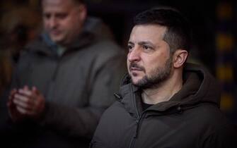 These images show a secret visit made by Ukraine’s President Volodymyr Zelenskyy to the frontlines in Bakhmut, Donetsk region, Ukraine, on Tuesday morning, December 20, 2022. The visit was kept under wraps until Zelensky had left the city, which has seen some of the fiercest fighting of Ukraine’s defence against Russia’s invasion in the past few months. While visiting troops, Zelenskyy honoured the soldiers with medals. In a statement, he said: 'Bakhmut Fortress. Our people. Unconquered by the enemy. Who with their bravery prove that we will endure and will not give up what’s ours. 'Ukraine is proud of you. I am proud of you! Thank you for the courage, resilience and strength shown in repelling the enemy attacks.' He told troops: 'The East is holding out because Bakhmut is fighting. This is the fortress of our morale. In fierce battles and at the cost of many lives, freedom is being defended here for all of us. 'Bakhmut defenders deserve our maximum support and our highest gratitude. That's why I am with them today. They are superhumans. They are our strength and our heroes.' Editorial Use Only. Photo by Ukrainian Presidency via ABACAPRESS.COM