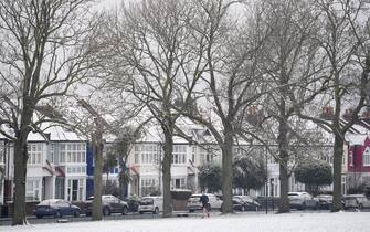 As March snow falls on south London, period homes are seen with white rooftops on a street bordering Ruskin Park, a public green space in Lambeth, on 8th March 2023, in London, England. (Photo by Richard Baker / In Pictures via Getty Images)