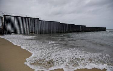 The border wall crosses the beach as it ends in the Pacific Ocean along the US-Mexico border between San Diego and Tijuana on May 10, 2021 at International Friendship Park in San Diego County, California. - Few issues have as long a history of bedeviling both Democrats and Republicans as immigration and asylum on the approximately 2,000-mile (3,000-kilometer) US-Mexico frontier. (Photo by Patrick T. FALLON / AFP) (Photo by PATRICK T. FALLON/AFP via Getty Images)