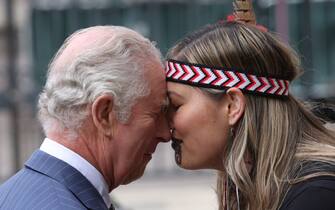 King Charles III is greeted with a 'Hongi' a traditional Maori greeting in New Zealand used by the Maori people, as he arrives for the annual Commonwealth Day Service at Westminster Abbey in London. Picture date: Monday March 13, 2023. (Photo by Belinda Jiao/PA Images via Getty Images)