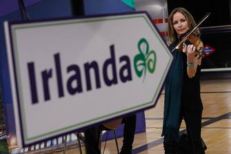 MADRID, SPAIN - MARCH 13: Singer and violinist Sharon Corr performs a surprise performance to inaugurate Ireland Week, in the main concourse of Chamartin Metro station, on 13 March, 2023 in Madrid, Spain.  The schedule of events in honor of Ireland's patron saint, St. Patrick, begins with this surprise performance in the Madrid Metro.  Sharon Corr, member together with her brothers of The Corrs, the mythical Irish band of international fame, inaugurates the Ireland Week.  Accompanied by other musicians, the Irish artist plays live for the subway users.  (Photo By Eduardo Parra/Europa Press via Getty Images)