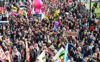 - Protesters holds flags and placards during a demonstration after the French government pushed a pensions reform through parliament without a vote, using the article 49.3 of the constitution, in Nantes, western France, on March 18, 2023. The French president on March 16 rammed a controversial pension reform through parliament without a vote, deploying a rarely used constitutional power that risks inflaming protests. The move was an admission that his government lacked a majority in the National Assembly to pass the legislation to raise the retirement age from 62 to 64.//SALOM-GOMIS_n023/Credit:Sebastien SALOM-GOMIS/SIPA/2303182021