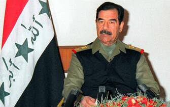 (FILES) Picture released 20 December 2002 by the official Iraqi News Agency shows Iraqi President Saddam Hussein delivering a televised speech. Hussein was reportetly arrested on Sunday, 14 December 2003, by US forces in the Iraqi city of Tikrit, a spokesman for the Patriotic Union of Kurdistan said.  EPA/INA  